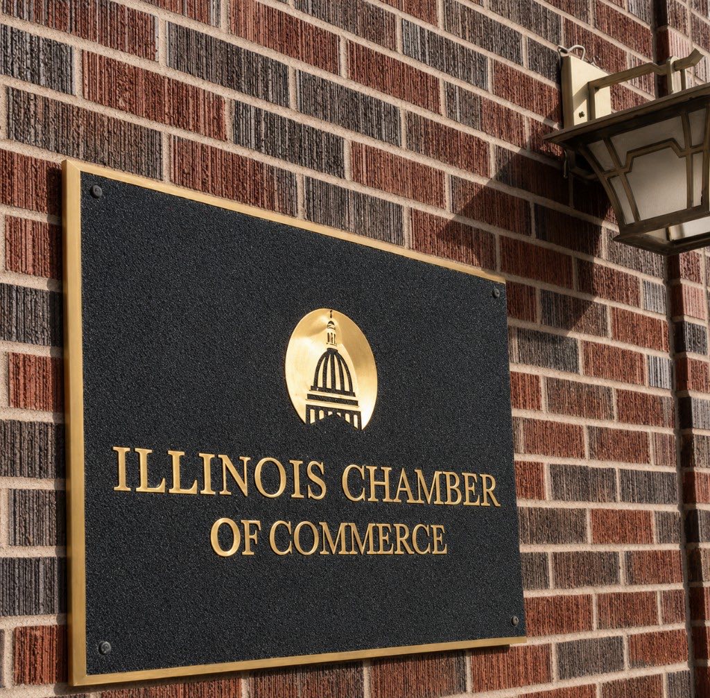 Illinois Chamber of Commerce plaque on the brick wall of the Chamber offices